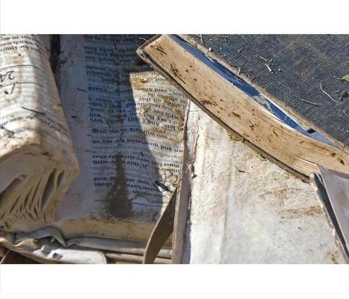 Image of books and documents damaged with water