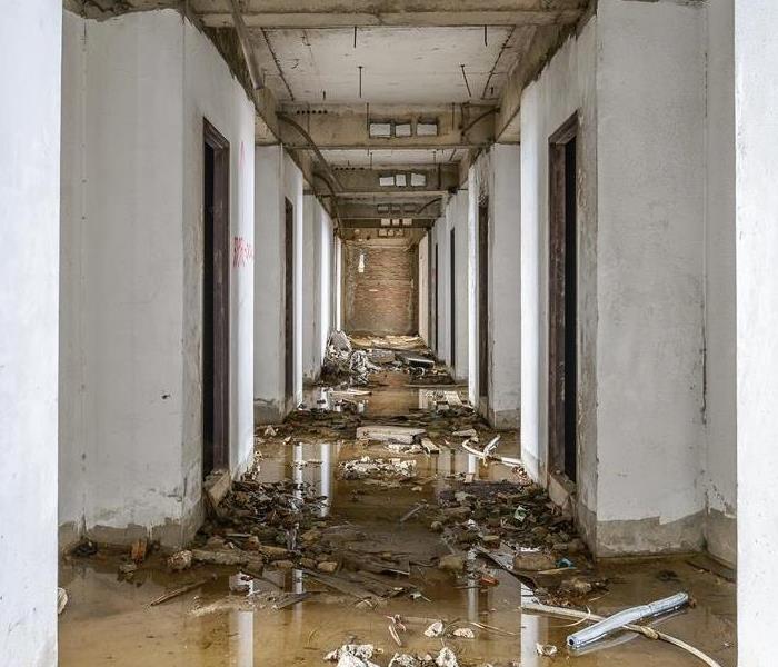 Flooded hallway with standing water